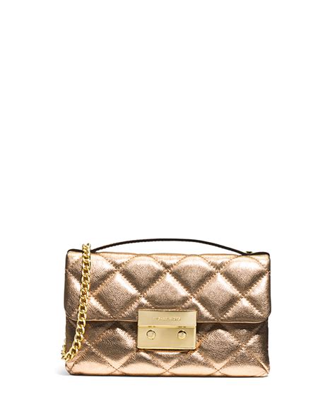 michael michael kors sloan small quilted messenger bag|Michael Kors quilted bag.